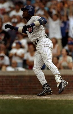 13 Sep 1998:  Sammy Sosa #21 of the Chicago Cubs hits his 62nd home run during the game against the Milwaukee Brewers at Wrigley Field in Chicago, Illinois. The Cubs defeated the Brewers 11-10. Mandatory Credit: Jonathan Daniel  /Allsport USED