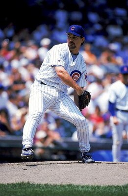 22 Jul 1999:  Pitcher Terry Mulholland #45 of the Chicago Cubs winds up for the pitch during the game against the Pittsburgh Pirates at Wrigley Field in Chicago, Illinois. The Cubs defeated the Pirates 5-3. Mandatory Credit: Jonathan Daniel  /Allsport