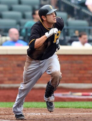 NEW YORK - MAY 09:  Freddy Sanchez #12 of the Pittsburgh Pirates runs against the New York Mets on May 9, 2009 at Citi Field in the Flushing neighborhood of the Queens borough of New York City. The Mets defeated the Pirates 10-1.  (Photo by Jim McIsaac/Ge