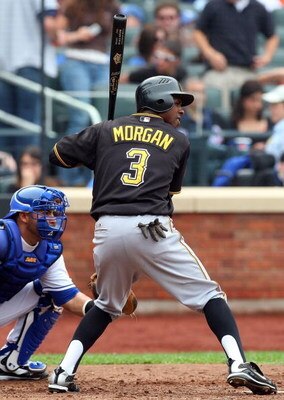NEW YORK - MAY 09:  Nyjer Morgan #3 of the Pittsburgh Pirates bats against the New York Mets on May 9, 2009 at Citi Field in the Flushing neighborhood of the Queens borough of New York City. The Mets defeated the Pirates 10-1.  (Photo by Jim McIsaac/Getty