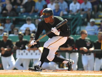 BRADENTON, FL - MARCH 8:  Outfielder Nyjer Morgan #3 of the Pittsburgh Pirates sets to bunt against the Houston Astros March 8, 2009 at McKechnie Field in Bradenton, Florida.  (Photo by Al Messerschmidt/Getty Images)