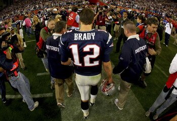 GLENDALE, AZ - FEBRUARY 03:  Quarterback Tom Brady #12 of the New England Patriots walks off the field after losing to the New York Giants 17-14 during Super Bowl XLII on February 3, 2008 at the University of Phoenix Stadium in Glendale, Arizona.  (Photo 