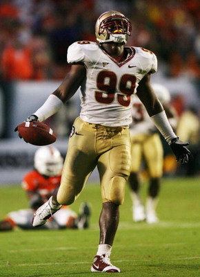 MIAMI - OCTOBER 04: Defensive end Everette Brown #99 of the Florida State Seminoles celebrates after defending a pass in the fourth quarter against the Miami Hurricanes at Dolphin Stadium on October 4, 2008 in Miami, Florida. (Photo by Doug Benc/Getty I