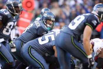 SEATTLE - NOVEMBER 23:  Quarterback Matt Hasselbeck #8 the Seattle Seahawks calls the play at the line of scrimmage during the game against the Washington Redskins on November 23, 2008 at Qwest Field in Seattle, Washington. (Photo by Otto Greule Jr/Getty 
