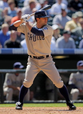DENVER - APRIL 29: Chris Burke #8 of the San Diego Padres pinch hits against the Colorado Rockies during MLB action at Coors Field on April 29, 2009 in Denver, Colorado. The Rockies defeated the Padres 7-5. (Photo by Doug Pensinger/Getty Images)
