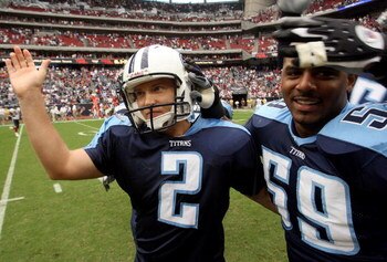 HOUSTON - OCTOBER 21:  Kicker Rob Bironas #2 of the Tennessee Titans is congratulated by Gilbert Gardner #59 and teammates after kicking the game-winning field goal and breaking the NFL record with 8 field goals in a game during the final seconds of the g