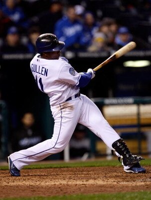 KANSAS CITY, MO - APRIL 27:  Jose Guillen #11 of  the Kansas City Royals bats against the Toronto Blue Jays at Kauffman Stadium on April 27, 2009 in Kansas City, Missouri. Guillen hit home runs in the first and fifth innings.  (Photo by Jamie Squire/Getty
