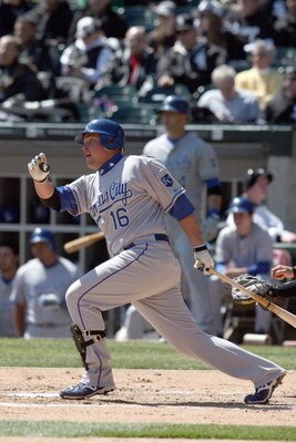 CHICAGO - APRIL 7:  Billy Butler #16 of the Kansas City Royals makes a hit against the Chicago White Sox during the Opening Day game on April 7, 2009 at U.S. Cellular Field in Chicago, Illinois. (Photo by Jonathan Daniel/Getty Images) 