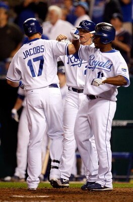 KANSAS CITY, MO - MAY 05:  Mike Jacobs #17 of the Kansas City Royals  is congratulated by Mark Teahen #24 and Jose Guillen #11 after hitting a three-run home run in the fourth inning against the Chicago White Sox on May 5, 2009 at Kauffman Stadium in Kans