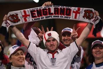 TEL AVIV, ISRAEL - NOVEMBER 17:  An England fan is surrounded by Russian fans at the start of the Euro 2008 qualifying match between Israel and Russia on November 17, 2007 at the national stadium in Ramat Gan near Tel Aviv, Israel.  (Photo by David Silver