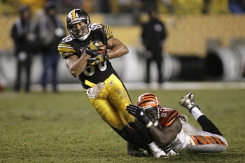 PITTSBURGH - DECEMBER 2:  Hines Ward #86 of the Pittsburgh Steelers is tackled during the NFL game against the Cincinnati Bengals at Heinz Field on December 2, 2007 in Pittsburgh, Pennsylvania. (Photo by Rick Stewart/Getty Images)