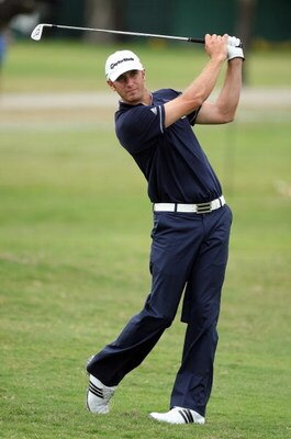 DORAL, FL - MARCH 13:  Dustin Johnson of the U.S. plays his second shot at the 18th hole during the second round of the World Golf Championships-CA Championship at the Doral Golf Resort & Spa on March 13, 2009 in Miami, Florida  (Photo by David Cannon/Get