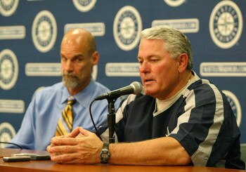 SEATTLE - JULY 01:  Manager Mike Hargrove #21 of the Seattle Mariners announces his resignation as General Manager Bill Bavasi looks on prior to a game against the Toronto Blue Jays July 1, 2007 at Safeco Field in Seattle, Washington. Bench coach John McL