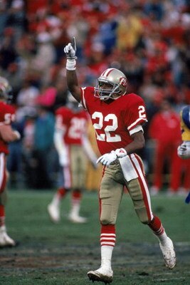 SAN FRANCISCO - JANUARY 14:  Cornerback Tim McKyer #22 of the San Francisco 49ers celebrates after a play during the NFC Championship game against the Los Angeles Rams at Candlestick Park on January 14, 1990 in San Francisco, California.  (Photo by George