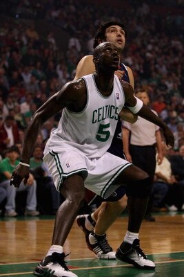 BOSTON - APRIL 20:  Kevin Garnett #5 of the Boston Celtics and Zaza Pachulia #27 of the Atlanta Hawks wait under the basket in Game One of the Eastern Conference Quarterfinals during the 2008 NBA Playoffs on April 20, 2008 at the TD Banknorth Garden in Bo