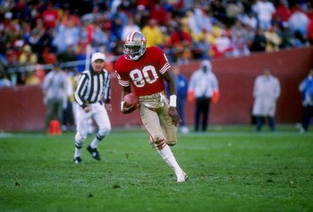 13 Oct 1988: Wide receiver Jerry Rice of the San Francisco 49ers runs down the field during a game against the Los Angeles Raiders at Candlestick Park in San Francisco, California. The Raiders won the game 9-3.