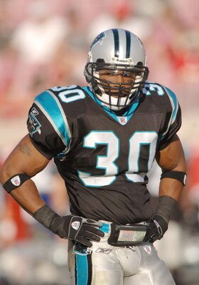 Carolina Panthers safety Mike Minter sets on defense against the Tampa Bay Buccaneers November 6, 2005 in Tampa.  The Panthers defeated the Bucs 34 - 14.  (Photo by Al Messerschmidt/Getty Images)