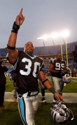 CHARLOTTE, NC - DECEMBER 4:  Mike Minter #30 of the Carolina Panthers reacts to defeating the Atlanta Falcons on December 4, 2005 at Bank of America Stadium in Charlotte, North Carolina. The Panthers defeated the Falcons 24-6.  (Photo by Streeter Lecka/Ge