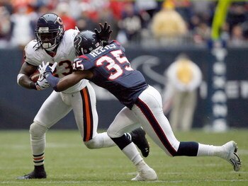 HOUSTON - DECEMBER 28:  Devin Hester #23 of the Chicago Bears runs after a catch against Jacques Reeves #35 of the Houston Texans during the second half at the Reliant Stadium on December 28, 2008 in Houston, Texas.  The Texans won 31-24.  (Photo by Harry