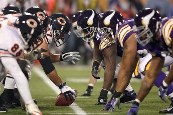 MINNEAPOLIS - NOVEMBER 30:  Center Josh Beekman #67 of the Chicago Bears gets ready to hike the ball during the game against the Minnesota Vikings at the Metrodome on November 30, 2008 in Minneapolis, Minnesota. (Photo by Jonathan Ferrey/Getty Images)