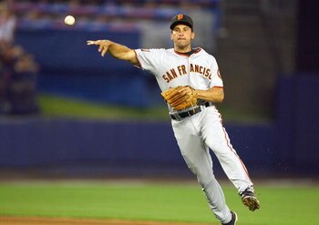 NEW YORK - MAY 30: Omar Vizquel#13 of the San Francisco Giants throws to firstbase against the New York Mets at Shea Stadium on May 30, 2007 in the Flushing neighborhood of the Queens borough of New York City. (Photo by Al Bello/Getty Images)