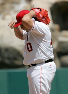 ANAHEIM, CA - APRIL 9:  Bartolo Colon #40 of the Los Angeles Angels of Anaheim adjusts his cap during the five run second inning by the New York Yankees on April 9, 2006 at Angel Stadium in Anaheim, California. The Yankees won 10-1.  (Photo by Stephen Dun