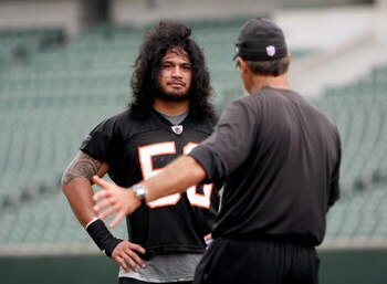 CINCINNATI, OH - MAY 1:  Cincinnati Bengals second round draft pick Rey Maualuga #58 listens to linebackers coach Jeff Fitgerald during rookie minicamp at Paul Brown Stadium on May 1, 2009 in Cincinnati, Ohio.  (Photo by Mark Lyons/Getty Images)