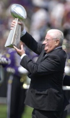 9 Sep 2001: Art Modell, owner of the Baltimore Ravens presents the superbowl trophy to the crowd during pre-game festivities at the game against the Chicago Bears at PSINet Stadium in Baltimore, Maryland.  The Ravens won 17-6. DIGITAL IMAGE. Mandatory Cre