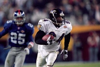28 Jan 2001:  Jermaine Lewis #84 of the Baltimore Ravens runs with the ball for an 84 yard touchdown return during the Super Bowl XXXV Game against the New York Giants at the Raymond James Stadium in Tampa, Florida. The Ravens defeated the Giants 34-7. Ma