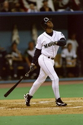6 Oct 1995:  Outfielder Ken Griffey Jr. of the Seattle Mariners stands at the plate looking up during a game against the New York Yankees at the Kingdome in Seattle, Washington.  The Mariners won the game 11-8. Mandatory Credit: Stephen Dunn  /Allsport