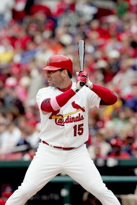 ST. LOUIS - MAY 14:  Jim Edmonds #15 of the St. Louis Cardinals bats against the Arizona Diamondbacks on May 14, 2006 at Busch Stadium in St. Louis, Missouri. The Diamondbacks defeated the St. Louis Cardinals 7-6. (Photo by Elsa/Getty Images)
