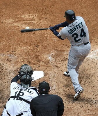 CHICAGO - APRIL 29: Ken Griffey, Jr. #24 of the Seattle Mariners hits the ball as catcher A.J. Pierzynski #12 of the Chicago White Sox awaits the ball on April 29, 2009 at U.S. Cellular Field in Chicago, Illinois. The White Sox defeated the Mariners 6-3. 