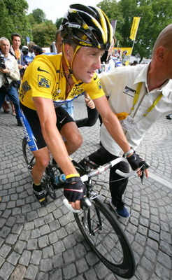 CORBEIL-ESSONNES, FRANCE - JULY 24: Lance Armstrong of the USA, riding for the Discovery Channel team, before Stage 21 of the Tour de France between Corbeille-Essones and The Champs Elysees on July 24, 2005 in Paris, France. (Photo by Robert Laberge/Gett