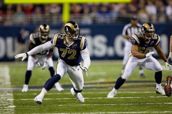 ST. LOUIS, MO - NOVEMBER 30:  Chris Long #72 of the St. Louis Rams rushes against the Miami Dolphins at the Edward Jones Dome on November 30, 2008 in St. Louis, Missouri.  The Dolphins beat the Rams 16-12.  (Photo by Dilip Vishwanat/Getty Images)