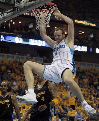NEW ORLEANS - APRIL 25:  Sean Marks #4 of the New Orleans Hornets slam dunks in Game Three of the Western Conference Quarterfinals against the Denver Nuggets during the 2009 NBA Playoffs at New Orleans Arena on April 25, 2009 in New Orleans, Louisiana. Th