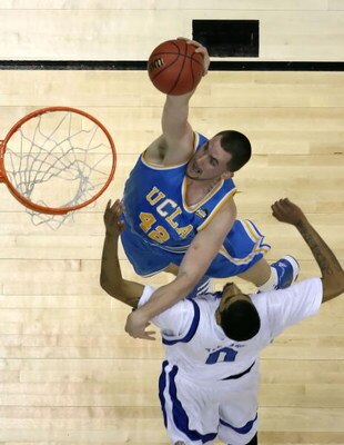 SAN ANTONIO - APRIL 05:  Kevin Love #42 of the UCLA Bruins goes up for a dunk against Shawn Taggart #0 of the Memphis Tigers during the National Semifinal game of the NCAA Men's Final Four at the Alamodome on April 5, 2008 in San Antonio, Texas.  (Photo b