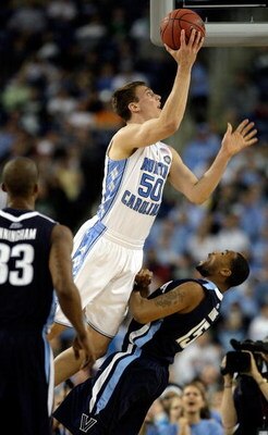 DETROIT - APRIL 04:  Tyler Hansbrough #50 of the North Carolina Tar Heels drives for a shot attempt in the second half against Reggie Redding #15 of the Villanova Wildcats during the National Semifinal game of the NCAA Division I Men's Basketball Champion
