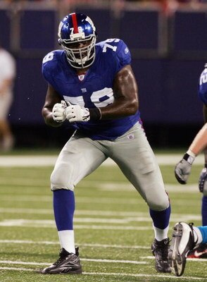 EAST RUTHERFORD, NJ - AUGUST 11:  Guy Whimper #79 of the New York Giants lines up against the Carolina Panthers on August 11, 2007 at Giants Stadium in East Rutherford, New Jersey. (Photo by Jim McIsaac/Getty Images) 
