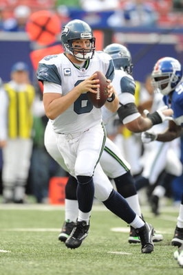 EAST RUTHERFORD, NJ - OCTOBER 05:  Matt Hasselback #8 of the Seattle Seahawks passes against the New York Giants during their game on October 5, 2008 at Giants Stadium in East Rutherford, New Jersey.  (Photo by Al Bello/Getty Images)
