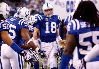 INDIANAPOLIS - DECEMBER 28:  Peyton Manning #18 of the Indianapolis Colts takes the field with teammates during player introductions prior to the first half of the game against the Tennessee Titans at Lucas Oil Stadium December 28, 2008 in Indianapolis, I