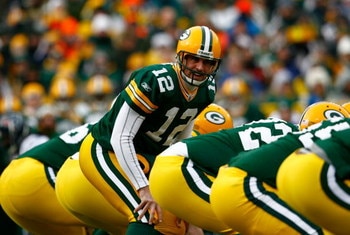 GREEN BAY, WI - DECEMBER 07:  Quarterback Aaron Rodgers #12 of the Green Bay Packers calls out a play against the Houston Texans during the first half at Lambeau Field on December 7, 2008 in Green Bay, Wisconsin. The Texans defeated the Packers 24-21.  (P