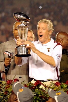 PASADENA, CA - JANUARY 01:  Head coach Pete Carroll of the USC Trojans celebrates with the trophy after defeating the Penn State Nittany Lions at the 95th Rose Bowl Game presented by Citi on January 1, 2009 at the Rose Bowl in Pasadena, California.  (Phot
