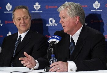 TORONTO - NOVEMBER 29:   MLSE President and CEO Richard Peddie and Brian Burke attend a press conference announcing Burke as the teams new General Manager November 29, 2008 at the Air Canada Centre in Toronto, Ontario, Canada. (Photo by Brad White/Getty I