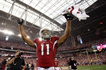 GLENDALE, AZ - JANUARY 18:  Wide receiver Larry Fitzgerald #11 of the Arizona Cardinals celebrates after winning the NFC championship game against the Philadelphia Eagles on January 18, 2009 at University of Phoenix Stadium in Glendale, Arizona. The Cardi