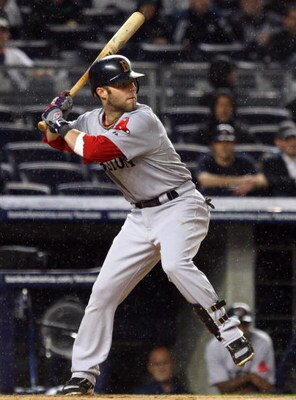 NEW YORK - MAY 05:  Dustin Pedroia #15 of the Boston Red Sox bats against the New York Yankees on May 5, 2009 at Yankee Stadium in the Bronx borough of New York City. The Red Sox defeated the Yankees 7-3.  (Photo by Jim McIsaac/Getty Images)