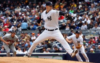 NEW YORK - MAY 17:  A.J. Burnett #34 of the New York Yankees pitches against the Minnesota Twins on May 17, 2009 at Yankee Stadium in the Bronx borough of New York City. The Yankees defeated the Twins 3-2 in ten innings.  (Photo by Jim McIsaac/Getty Image