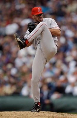 SEATTLE - APRIL 08:  Pitcher Ben Weber #77 of the Anaheim Angels delivers the ball during the MLB game against the Seattle Mariners on opening day at Safeco Field on April 8, 2003 in Seattle Washington.  The Mariners defeated the Angels 5-0.  (Photo by Ot
