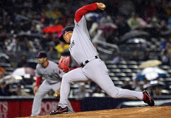 NEW YORK - MAY 05:  Hideki Okajima #37 of the Boston Red Sox pitches against the New York Yankees on May 5, 2009 at Yankee Stadium in the Bronx borough of New York City. The Red Sox defeated the Yankees 7-3.  (Photo by Jim McIsaac/Getty Images)