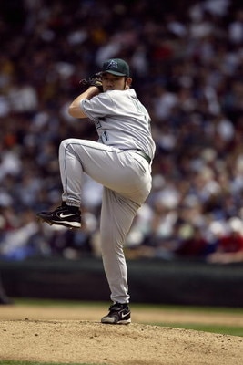 SEATTLE - JUNE 5:  Hideo Nomo #11 of the Tampa Bay Devil Rays pitches during the game with the Seattle Mariners on June 5 2005 at Safeco Field in Seattle Washington. The Mariners won 6-5.   (Photo by Otto Greule Jr/Getty Images) 