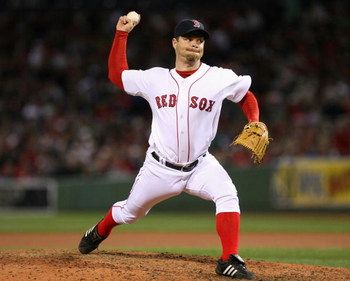 BOSTON - OCTOBER 13:  Relief pitcher Paul Byrd #36 of the Boston Red Sox delivers a pitch against the Tampa Bay Rays in game three of the American League Championship Series during the 2008 MLB playoffs at Fenway Park on October 13, 2008 in Boston, Massac